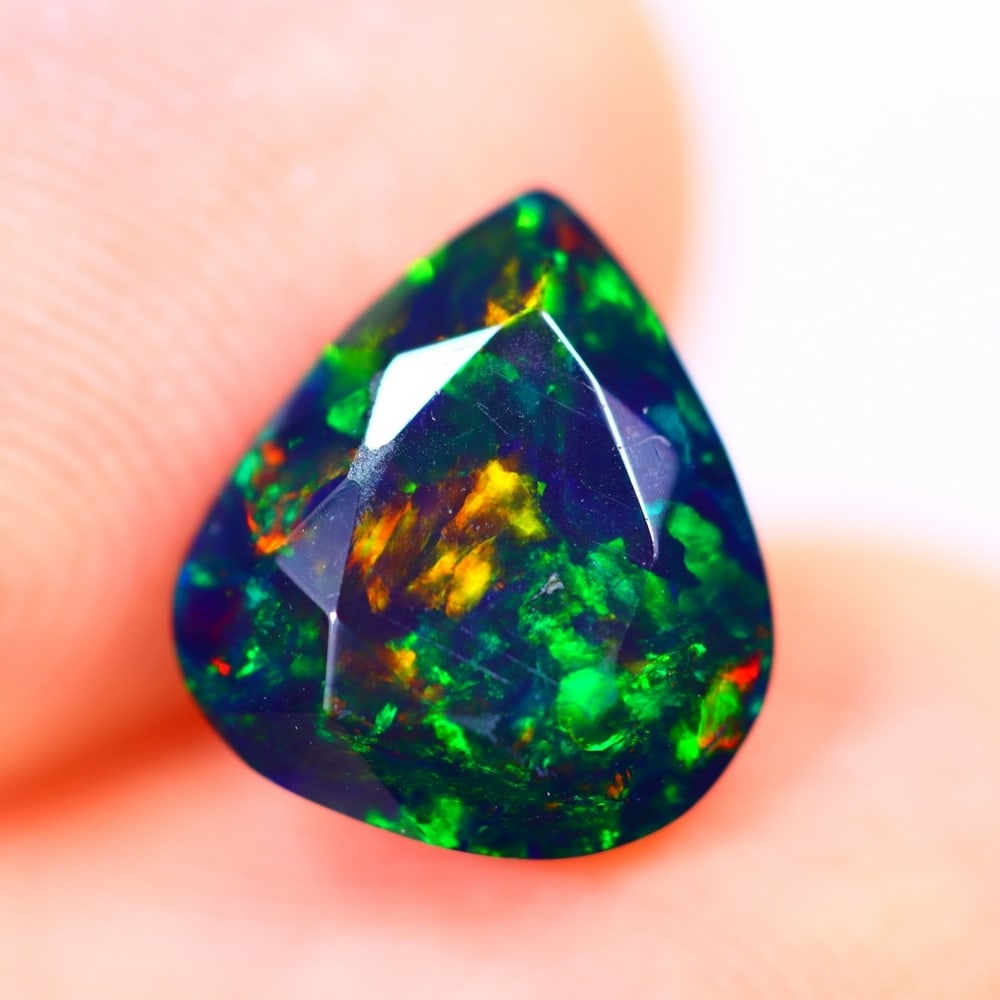 1.50Ct Welo Black Opal Polished - Ethiopian Opal - Pear Faceted: Ksmith Jewels Global Welcome to our auction house, today auction brought to you by Ksmith Jewels Global based in Penang, Malaysia specialize in all kinds of opal and color gemstone both in manufacturi