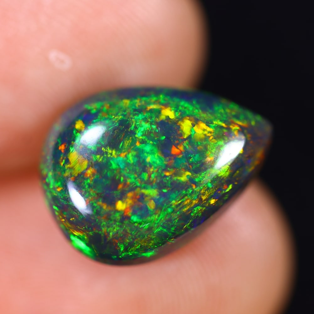 4.51Ct Welo Black Opal Polished - Ethiopian Opal - Pear Cabochon: Ksmith Jewels Global Welcome to our auction house, today auction brought to you by Ksmith Jewels Global based in Penang, Malaysia specialize in all kinds of opal and color gemstone both in manufacturi