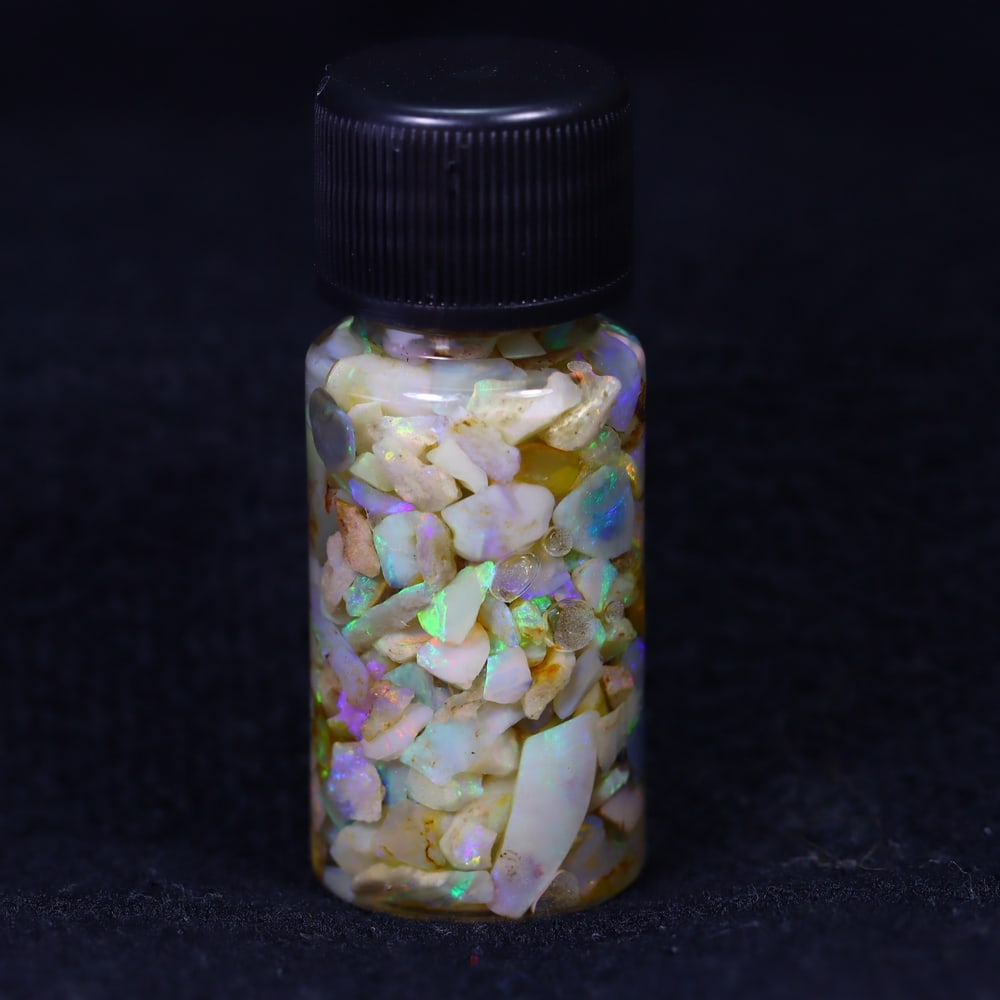 Australian Lightning Ridge Crystal Black Opal Rough Chip Jar (Good For Display): Ksmith Jewels Global Welcome to our auction house, today auction brought to you by Ksmith Jewels Global based in Penang, Malaysia specialize in all kinds of opal and color gemstone both in manufacturi