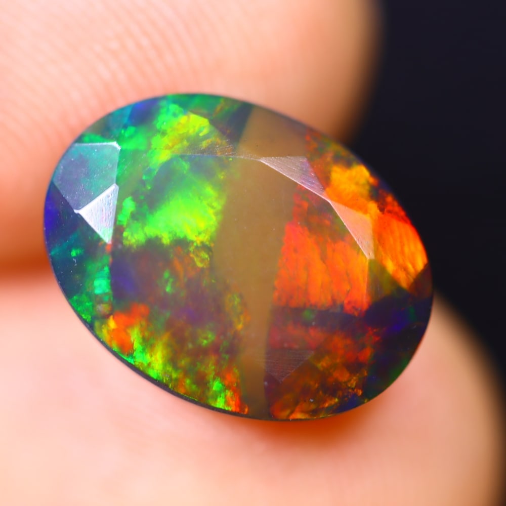 2.84Ct Welo Black Opal Polished - Ethiopian Opal - Oval Faceted: Ksmith Jewels Global Welcome to our auction house, today auction brought to you by Ksmith Jewels Global based in Penang, Malaysia specialize in all kinds of opal and color gemstone both in manufacturi