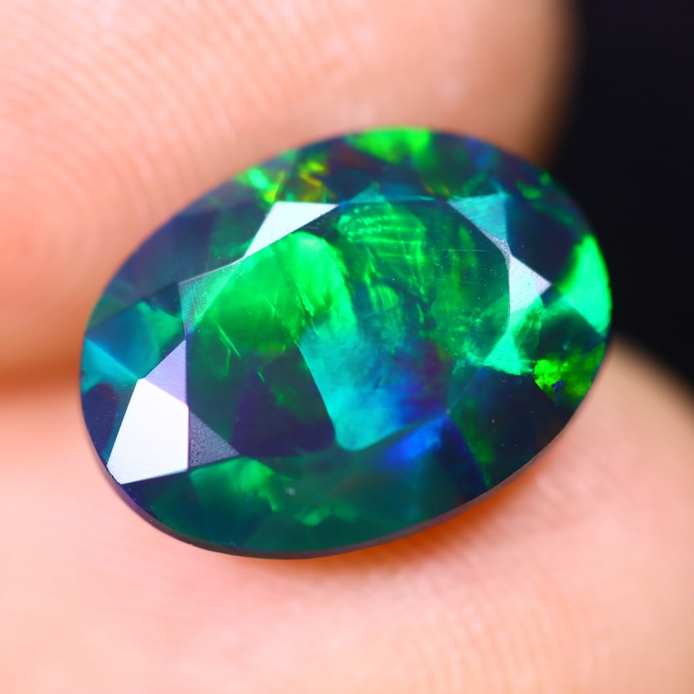 2.23Ct Welo Black Opal Polished - Ethiopian Opal - Oval Faceted: Ksmith Jewels Global Welcome to our auction house, today auction brought to you by Ksmith Jewels Global based in Penang, Malaysia specialize in all kinds of opal and color gemstone both in manufacturi