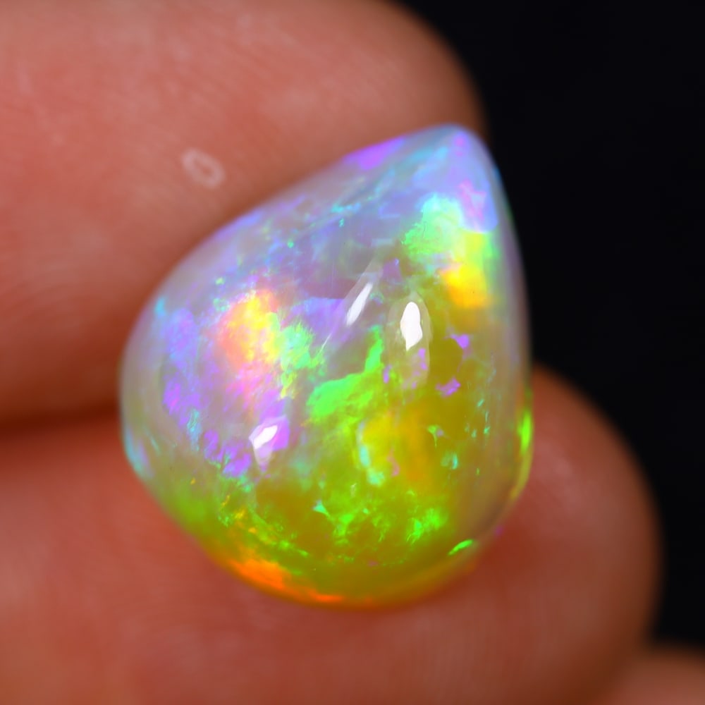 6.92Ct Welo Opal Polished - Ethiopian Opal: Ksmith Jewels Global Welcome to our auction house, today auction brought to you by Ksmith Jewels Global based in Penang, Malaysia specialize in all kinds of opal and color gemstone both in manufacturi