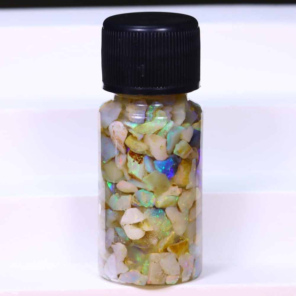 Australian Lightning Ridge Crystal Black Opal Rough Chip Jar (Good For Display): Ksmith Jewels Global Welcome to our auction house, today auction brought to you by Ksmith Jewels Global based in Penang, Malaysia specialize in all kinds of opal and color gemstone both in manufacturi