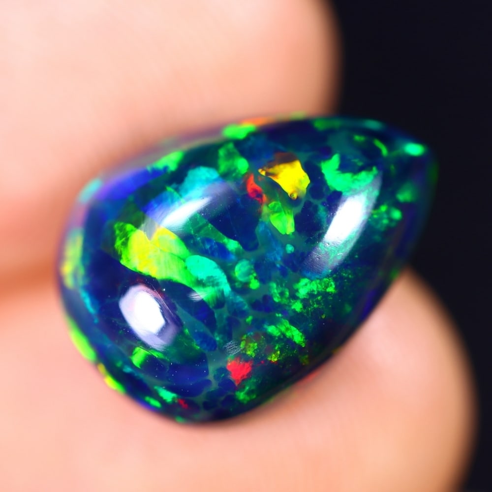 4.51Ct Welo Black Opal Polished - Ethiopian Opal - Pear Cabochon: Ksmith Jewels Global Welcome to our auction house, today auction brought to you by Ksmith Jewels Global based in Penang, Malaysia specialize in all kinds of opal and color gemstone both in manufacturi