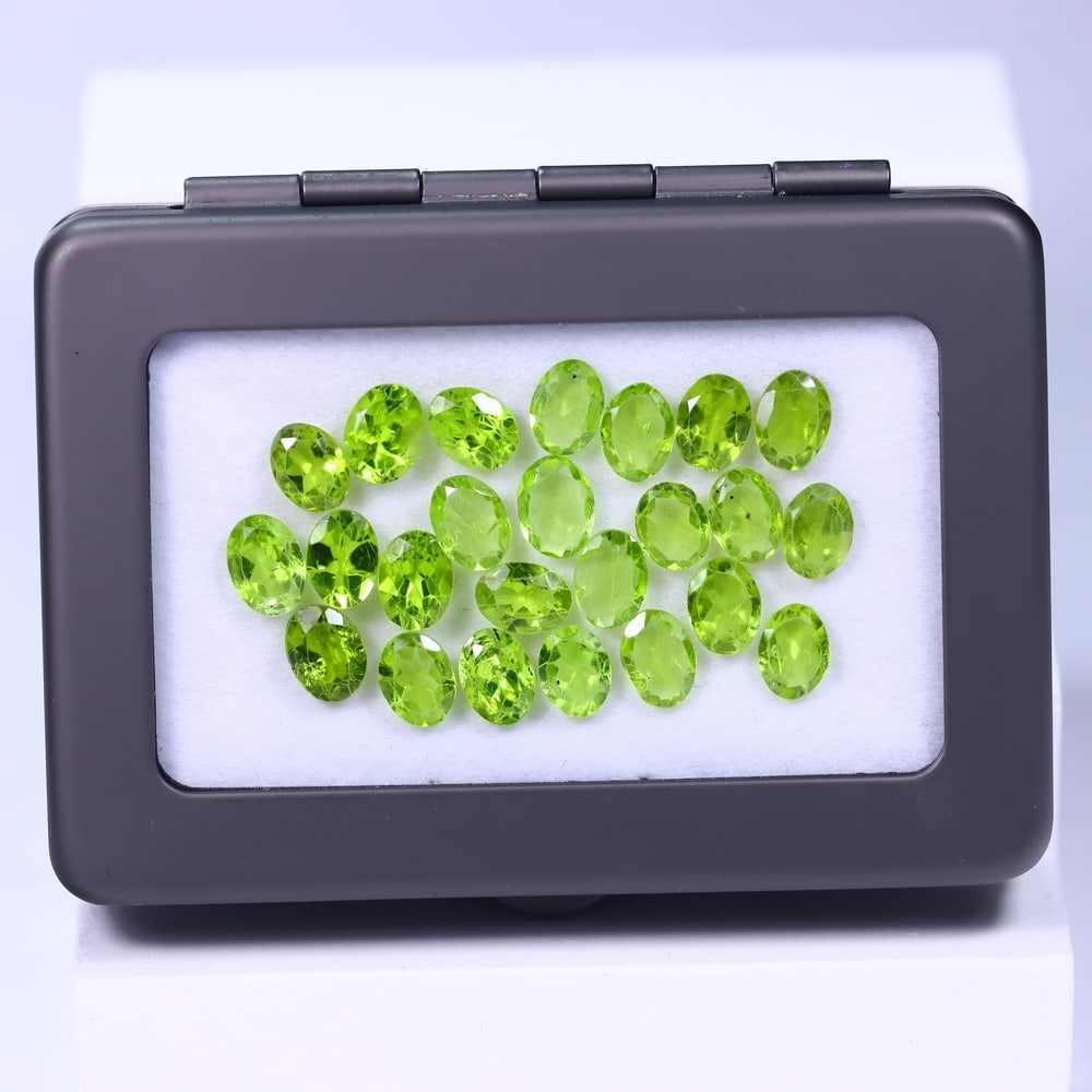 26.11Ct Peridot Lot - Polished Faceted - Oval Faceted: Ksmith Jewels Global Welcome to our auction house, today auction brought to you by Ksmith Jewels Global based in Penang, Malaysia specialize in all kinds of opal and color gemstone both in manufacturi