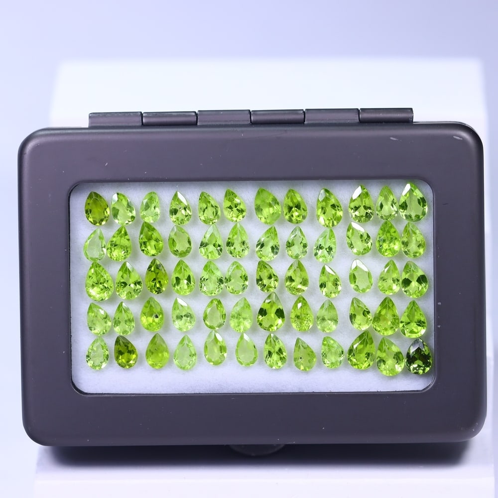28.76Ct Peridot Lot - Polished Faceted - Pear Faceted: Ksmith Jewels Global Welcome to our auction house, today auction brought to you by Ksmith Jewels Global based in Penang, Malaysia specialize in all kinds of opal and color gemstone both in manufacturi