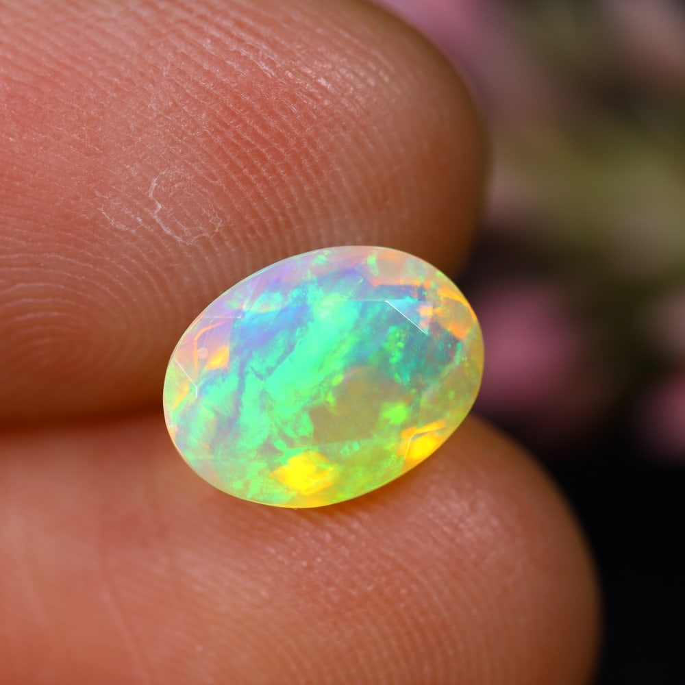 1.58Ct Welo Opal - Ethiopian Opal - Oval Faceted: Ksmith Jewels Global Welcome to our auction house, today auction brought to you by Ksmith Jewels Global based in Penang, Malaysia specialize in all kinds of opal and color gemstone both in manufacturi