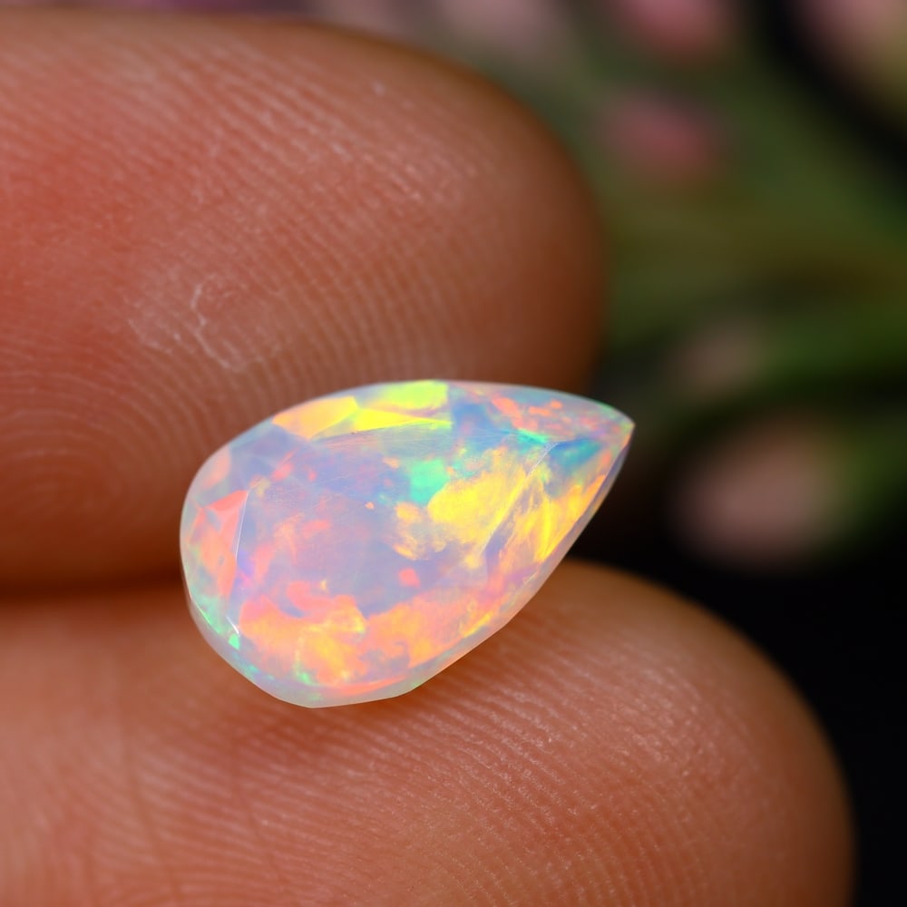 1.58Ct Welo Opal - Ethiopian Opal - Pear Faceted: Ksmith Jewels Global Welcome to our auction house, today auction brought to you by Ksmith Jewels Global based in Penang, Malaysia specialize in all kinds of opal and color gemstone both in manufacturi