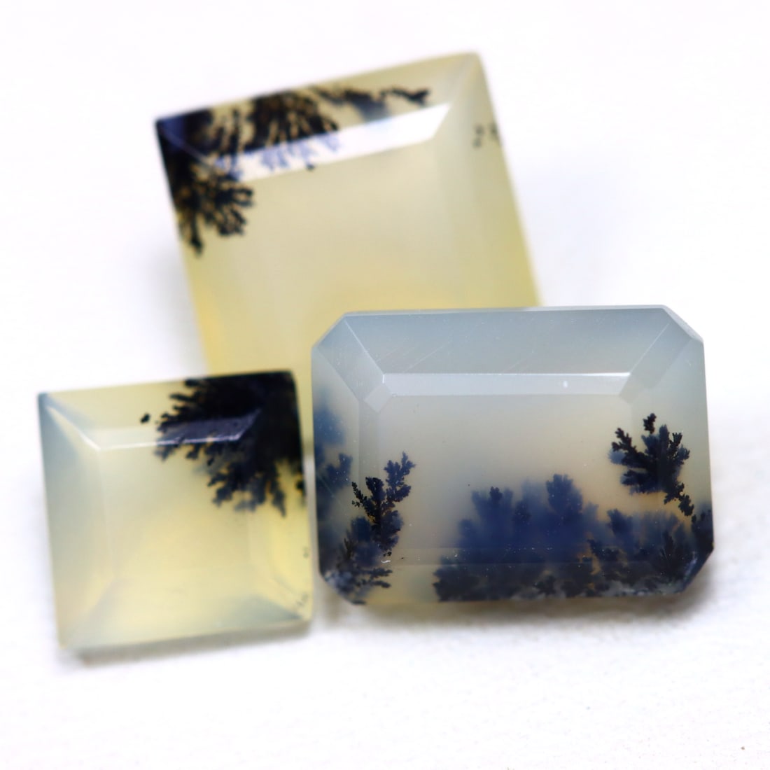 Dendrite Opal 4.61Ct Square Cut Natural Faceted Dendrite Opal 3 Pieces OT7053: Ksmith Jewels Global Welcome to our auction house, today auction brought to you by Ksmith Jewels Global based in Penang, Malaysia specialize in all kinds of opal and color gemstone both in manufacturi