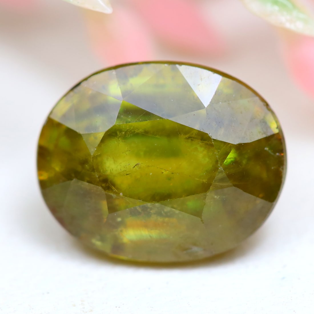 Sphene 3.51Ct Natural Oval Cut Unheated Yellowish Green Sphene: Ksmith Jewels Global Welcome to our auction house, today auction brought to you by Ksmith Jewels Global based in Penang, Malaysia specialize in all kinds of opal and color gemstone both in manufacturi