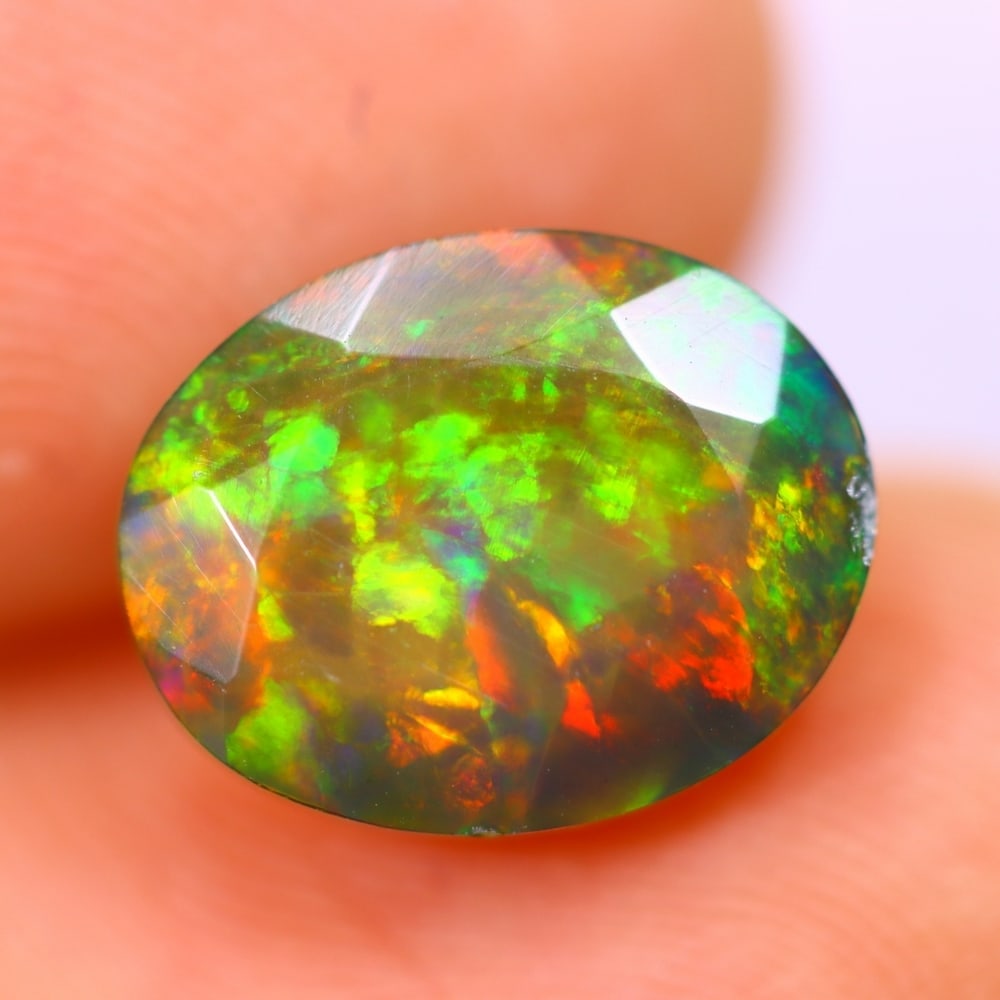 2.53Ct Welo Black Opal Polished - Ethiopian Opal - Oval Faceted: Ksmith Jewels Global Welcome to our auction house, today auction brought to you by Ksmith Jewels Global based in Penang, Malaysia specialize in all kinds of opal and color gemstone both in manufacturi