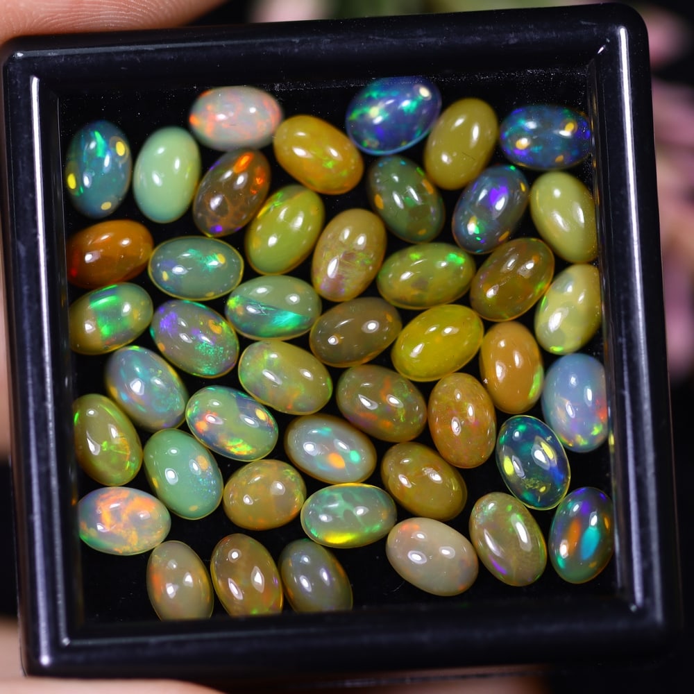 14.05Ct Welo Opal Lot - Ethiopian Opal: Ksmith Jewels Global Welcome to our auction house, today auction brought to you by Ksmith Jewels Global based in Penang, Malaysia specialize in all kinds of opal and color gemstone both in manufacturi