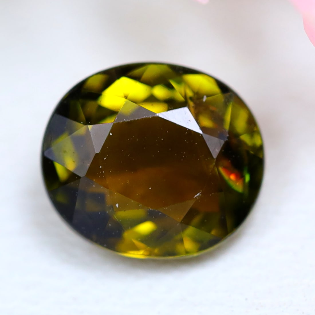Tourmaline 1.63Ct Oval Cut Natural Mozambique Yellowish Green Tourmaline: Ksmith Jewels Global Welcome to our auction house, today auction brought to you by Ksmith Jewels Global based in Penang, Malaysia specialize in all kinds of opal and color gemstone both in manufacturi
