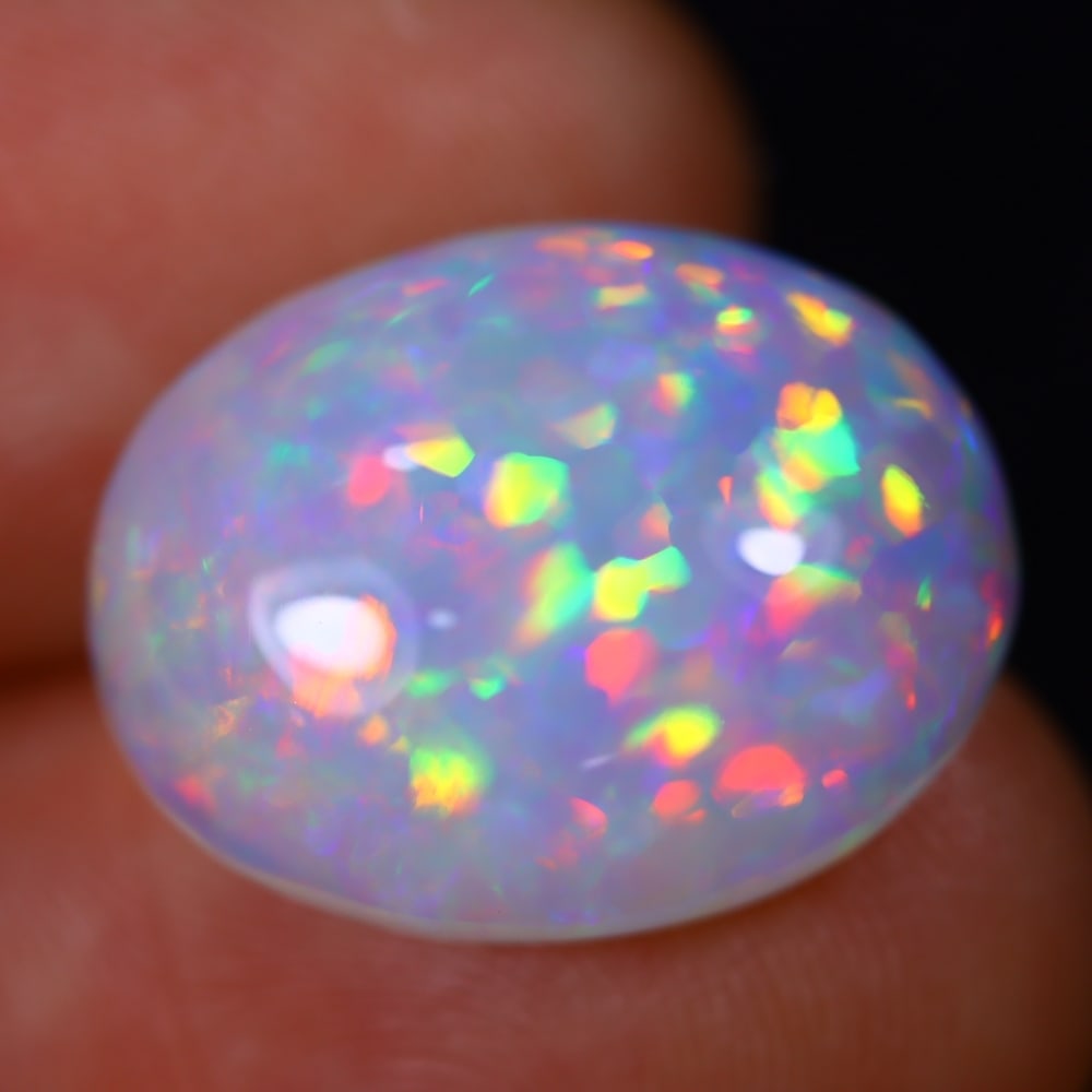 9.22Ct Welo Opal Polished - Ethiopian Opal - Oval Cabochon: Ksmith Jewels Global Welcome to our auction house, today auction brought to you by Ksmith Jewels Global based in Penang, Malaysia specialize in all kinds of opal and color gemstone both in manufacturi
