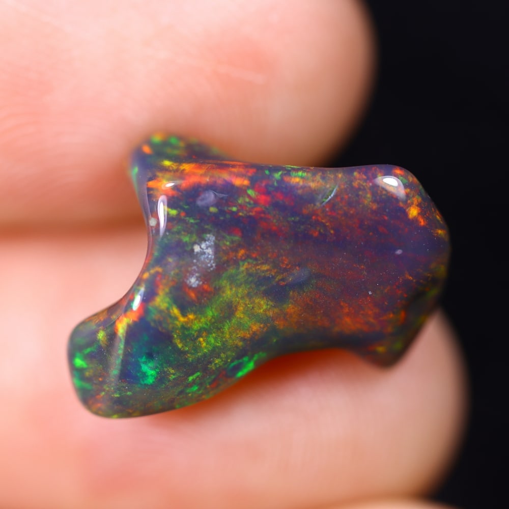 5.21Ct Natural Freeform Black Opal - 14x9x6mm - Polished Rough: Ksmith Jewels Global Welcome to our auction house, today auction brought to you by Ksmith Jewels Global based in Penang, Malaysia specialize in all kinds of opal and color gemstone both in manufacturi