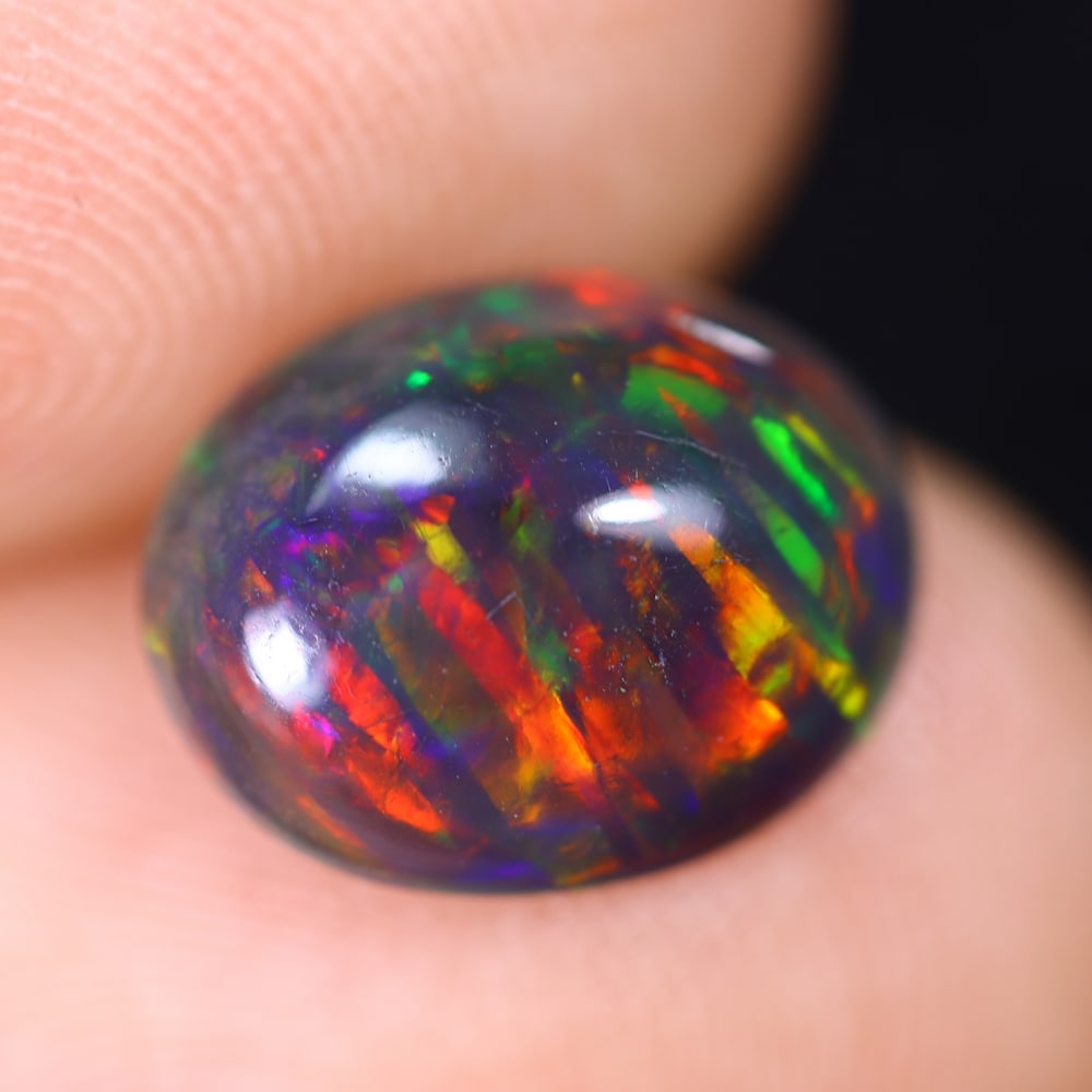 1.61Ct Welo Black Opal Polished - Ethiopian Opal: Ksmith Jewels Global Welcome to our auction house, today auction brought to you by Ksmith Jewels Global based in Penang, Malaysia specialize in all kinds of opal and color gemstone both in manufacturi