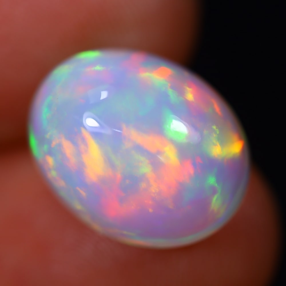 5.99Ct Welo Opal Polished - Ethiopian Opal - Oval Cabochon: Ksmith Jewels Global Welcome to our auction house, today auction brought to you by Ksmith Jewels Global based in Penang, Malaysia specialize in all kinds of opal and color gemstone both in manufacturi