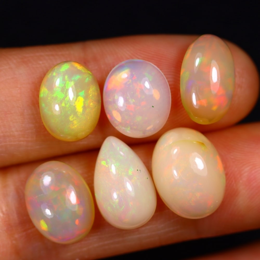 14.93Ct Group of 6 Welo Opal Polished - Ethiopian Opal: Ksmith Jewels Global Welcome to our auction house, today auction brought to you by Ksmith Jewels Global based in Penang, Malaysia specialize in all kinds of opal and color gemstone both in manufacturi