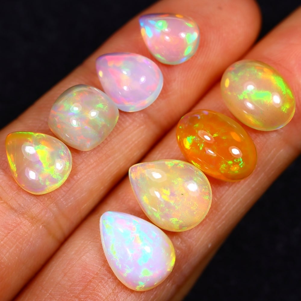 13.97Ct Group of 8 Welo Opal Polished - Ethiopian Opal: Ksmith Jewels Global Welcome to our auction house, today auction brought to you by Ksmith Jewels Global based in Penang, Malaysia specialize in all kinds of opal and color gemstone both in manufacturi