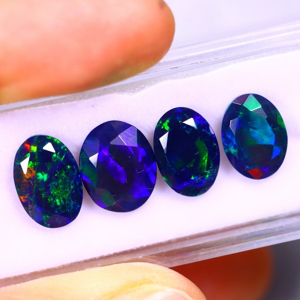6.88Ct Group of 4 Welo Black Opal Polished - Ethiopian Opal - Faceted Set: Ksmith Jewels Global Welcome to our auction house, today auction brought to you by Ksmith Jewels Global based in Penang, Malaysia specialize in all kinds of opal and color gemstone both in manufacturi