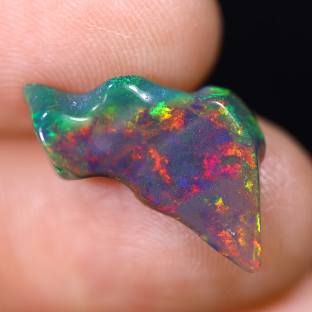 2.64Ct Natural Freeform Black Opal - 16x10x4mm - Polished Rough: Ksmith Jewels Global Welcome to our auction house, today auction brought to you by Ksmith Jewels Global based in Penang, Malaysia specialize in all kinds of opal and color gemstone both in manufacturi