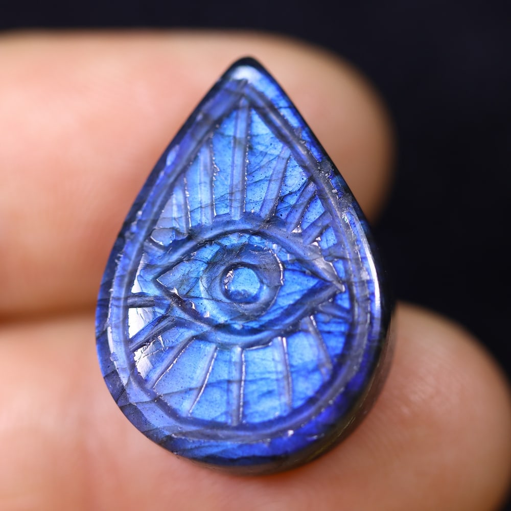 17.19cts Labradorite Evil Eye - Carving: Ksmith Jewels Global Welcome to our auction house, today auction brought to you by Ksmith Jewels Global based in Penang, Malaysia specialize in all kinds of opal and color gemstone both in manufacturi