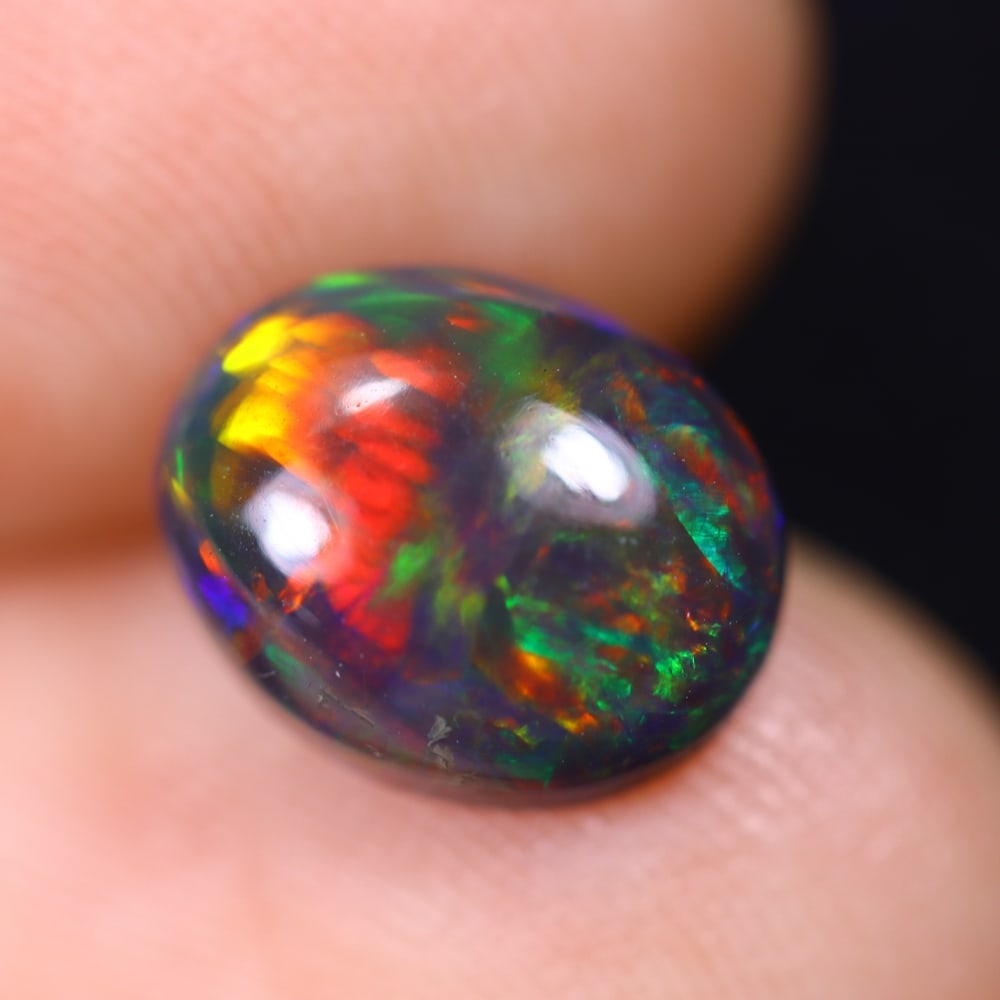 1.58Ct Welo Black Opal Polished - Ethiopian Opal: Ksmith Jewels Global Welcome to our auction house, today auction brought to you by Ksmith Jewels Global based in Penang, Malaysia specialize in all kinds of opal and color gemstone both in manufacturi