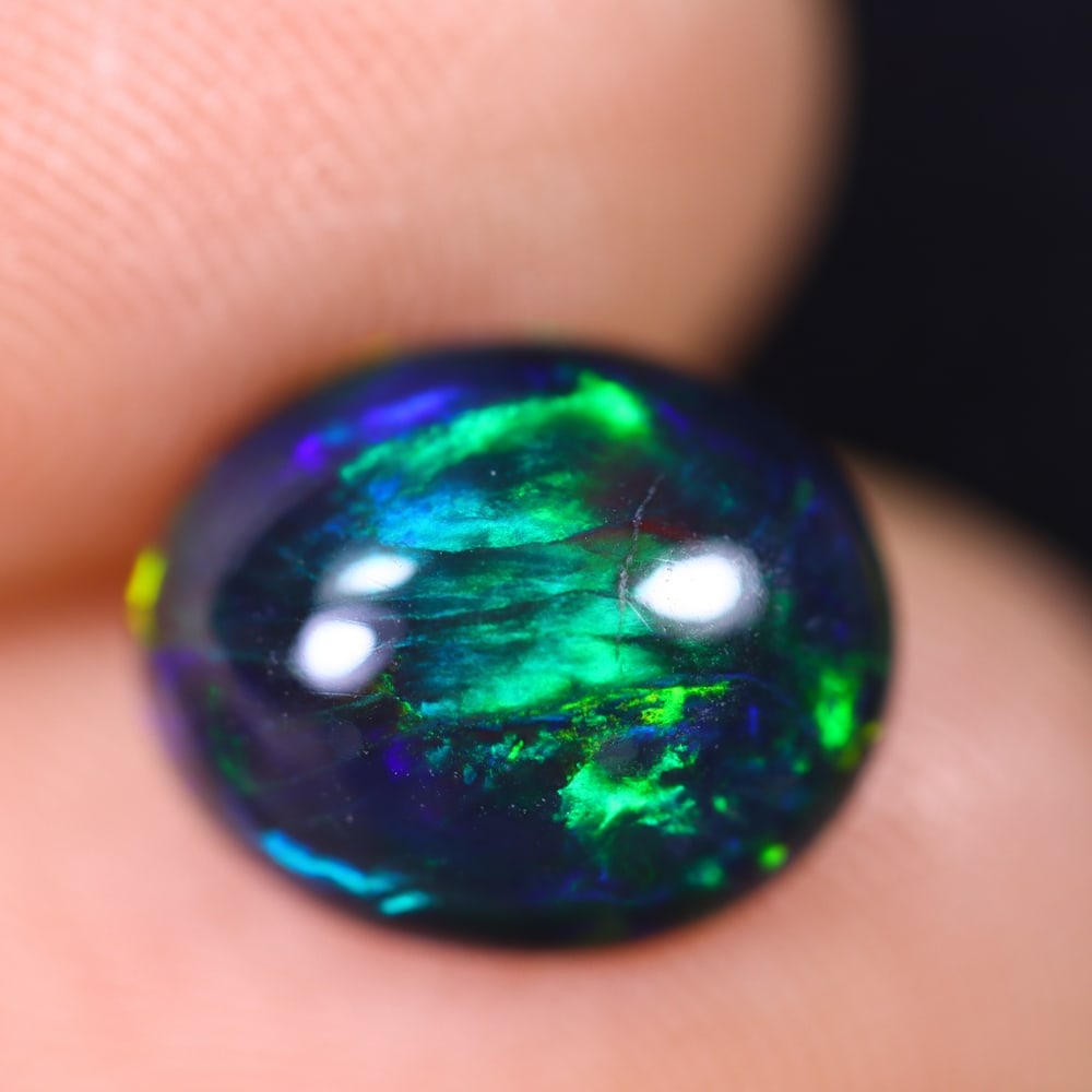2.27Ct Welo Black Opal Polished - Ethiopian Opal - Oval Cabochon: Ksmith Jewels Global Welcome to our auction house, today auction brought to you by Ksmith Jewels Global based in Penang, Malaysia specialize in all kinds of opal and color gemstone both in manufacturi