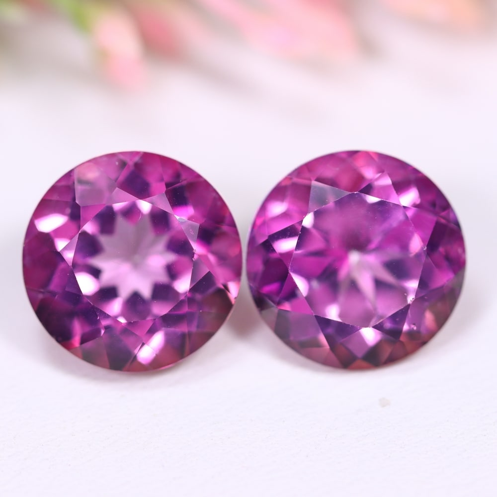 16.37Ct Purplish Pink Topaz Pair - Polished Faceted: Ksmith Jewels Global Welcome to our auction house, today auction brought to you by Ksmith Jewels Global based in Penang, Malaysia specialize in all kinds of opal and color gemstone both in manufacturi