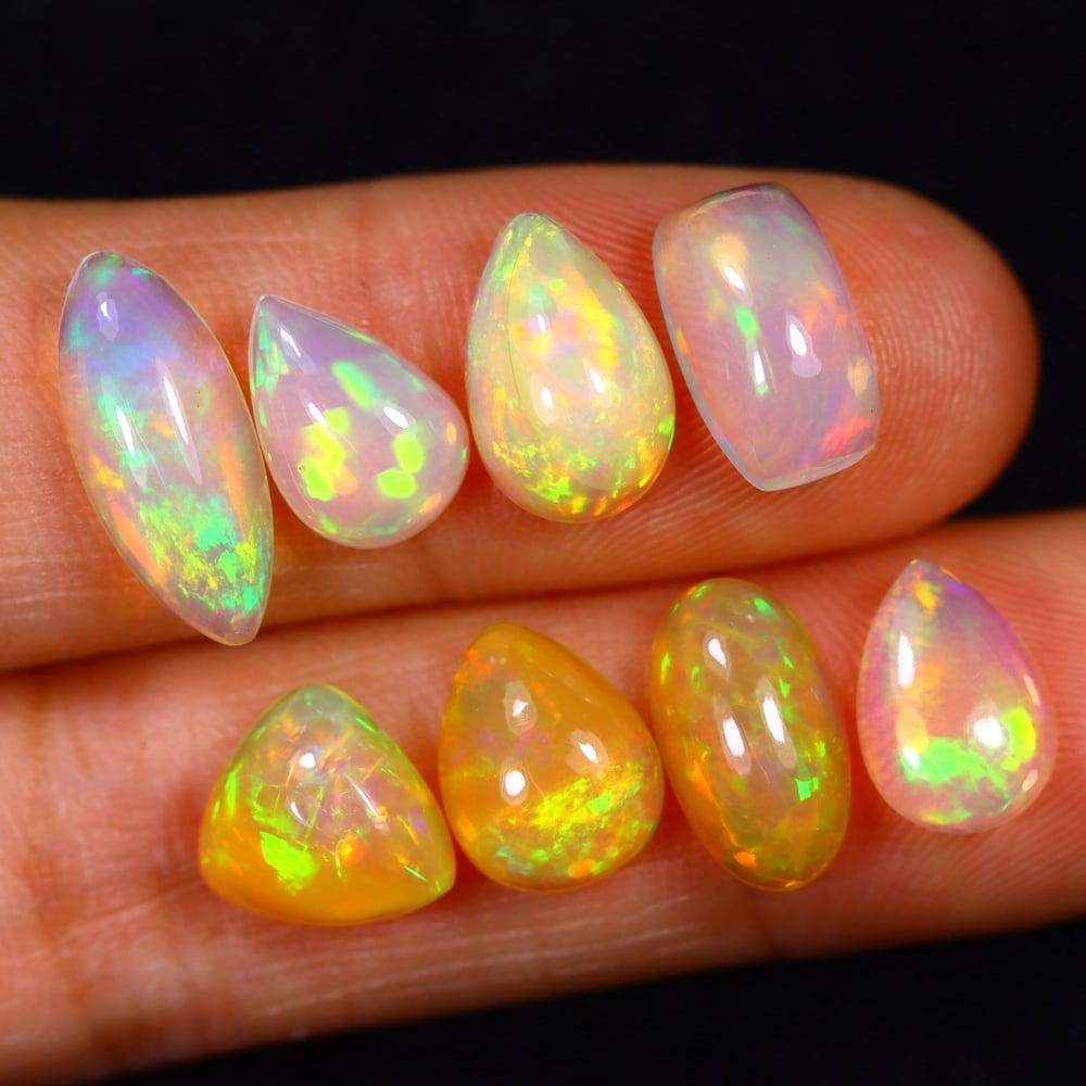 11.11Ct Group of 8 Welo Opal Polished - Ethiopian Opal: Ksmith Jewels Global Welcome to our auction house, today auction brought to you by Ksmith Jewels Global based in Penang, Malaysia specialize in all kinds of opal and color gemstone both in manufacturi