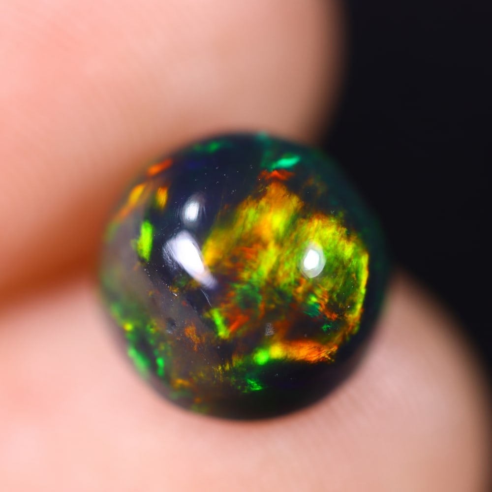 2.27Ct Welo Black Opal Polished - Ethiopian Opal: Ksmith Jewels Global Welcome to our auction house, today auction brought to you by Ksmith Jewels Global based in Penang, Malaysia specialize in all kinds of opal and color gemstone both in manufacturi