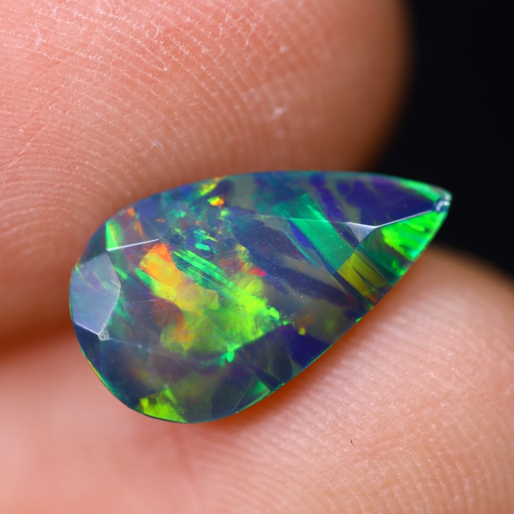 1.39Ct Welo Black Opal - Ethiopian Opal - Faceted Polished: Ksmith Jewels Global Welcome to our auction house, today auction brought to you by Ksmith Jewels Global based in Penang, Malaysia specialize in all kinds of opal and color gemstone both in manufacturi