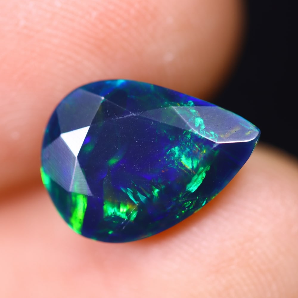 1.96Ct Welo Black Opal - Ethiopian Opal - Faceted Polished: Ksmith Jewels Global Welcome to our auction house, today auction brought to you by Ksmith Jewels Global based in Penang, Malaysia specialize in all kinds of opal and color gemstone both in manufacturi