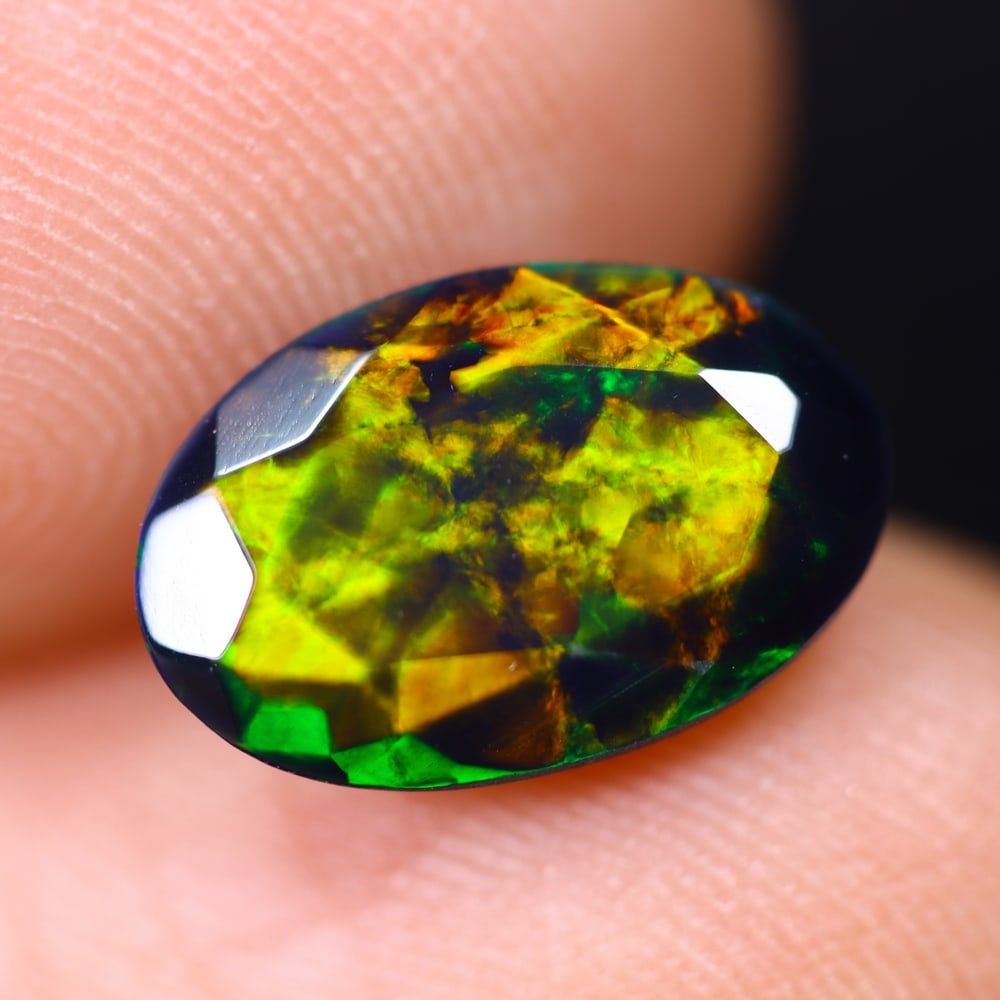 1.56Ct Ethiopian Welo Black Opal - Faceted Polished: Ksmith Jewels Global Welcome to our auction house, today auction brought to you by Ksmith Jewels Global based in Penang, Malaysia specialize in all kinds of opal and color gemstone both in manufacturi