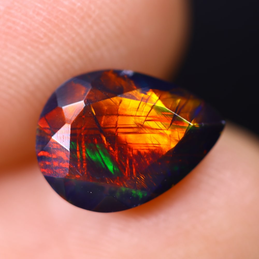 1.59Ct Ethiopian Welo Black Opal - Faceted Polished: Ksmith Jewels Global Welcome to our auction house, today auction brought to you by Ksmith Jewels Global based in Penang, Malaysia specialize in all kinds of opal and color gemstone both in manufacturi