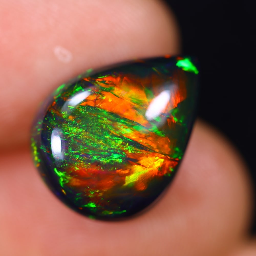 5.42Ct Welo Black Opal Polished - Ethiopian Opal - Pear Cabochon: Ksmith Jewels Global Welcome to our auction house, today auction brought to you by Ksmith Jewels Global based in Penang, Malaysia specialize in all kinds of opal and color gemstone both in manufacturi