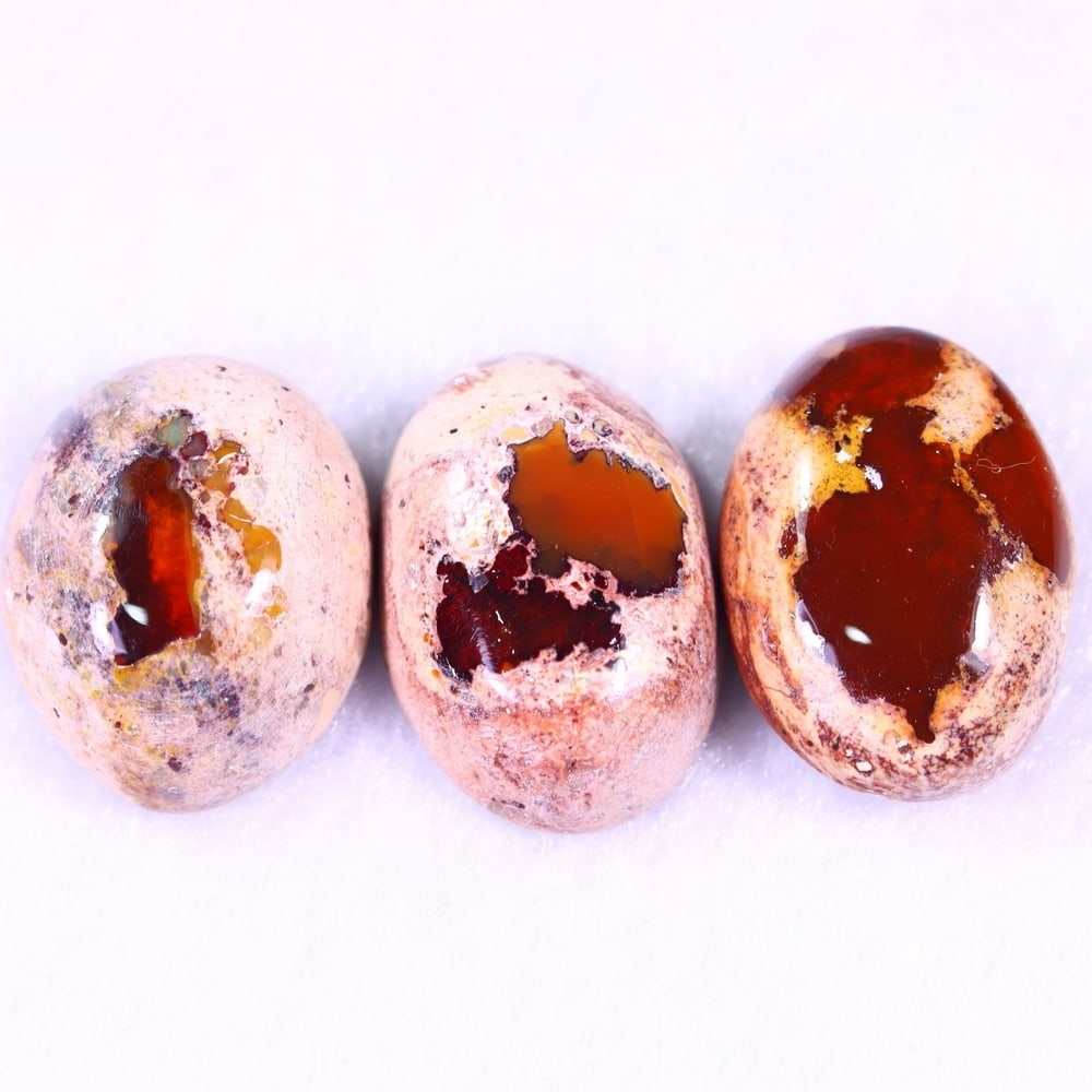 25.41Ct Group of 3 Mexican Fire Opal - Mexican Opal - Cabochon: Ksmith Jewels Global Welcome to our auction house, today auction brought to you by Ksmith Jewels Global based in Penang, Malaysia specialize in all kinds of opal and color gemstone both in manufacturi