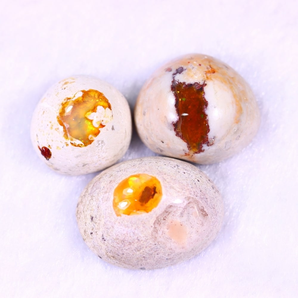 25.57Ct Group of 3 Mexican Fire Opal - Mexican Opal - Cabochon: Ksmith Jewels Global Welcome to our auction house, today auction brought to you by Ksmith Jewels Global based in Penang, Malaysia specialize in all kinds of opal and color gemstone both in manufacturi