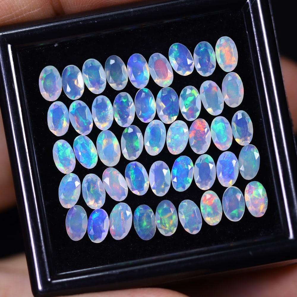 *7.03Ct 45pcs Calibrated 5x3mm Faceted Welo Opal Set - Ethiopian Opal: Ksmith Jewels Global Welcome to our auction house, today auction brought to you by Ksmith Jewels Global based in Penang, Malaysia specialize in all kinds of opal and color gemstone both in manufacturi