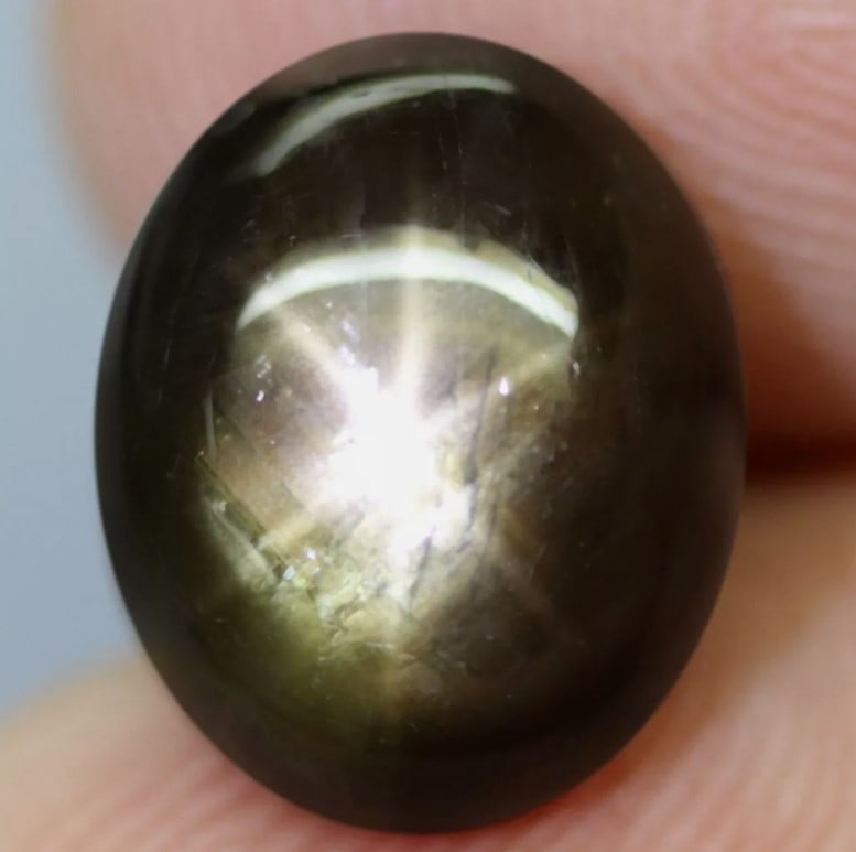 Star Sapphire 12.41Ct Natural Greenish 6 Rays Gold Star Sapphire: Ksmith Jewels Global Welcome to our auction house, today auction brought to you by Ksmith Jewels Global based in Penang, Malaysia specialize in all kinds of opal and color gemstone both in manufacturi