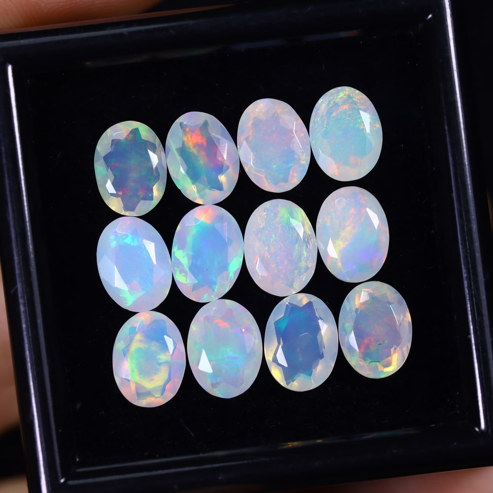 *8.97Ct 12pcs Calibrated 8x6mm Faceted Welo Opal Set - Ethiopian Opal: Ksmith Jewels Global Welcome to our auction house, today auction brought to you by Ksmith Jewels Global based in Penang, Malaysia specialize in all kinds of opal and color gemstone both in manufacturi