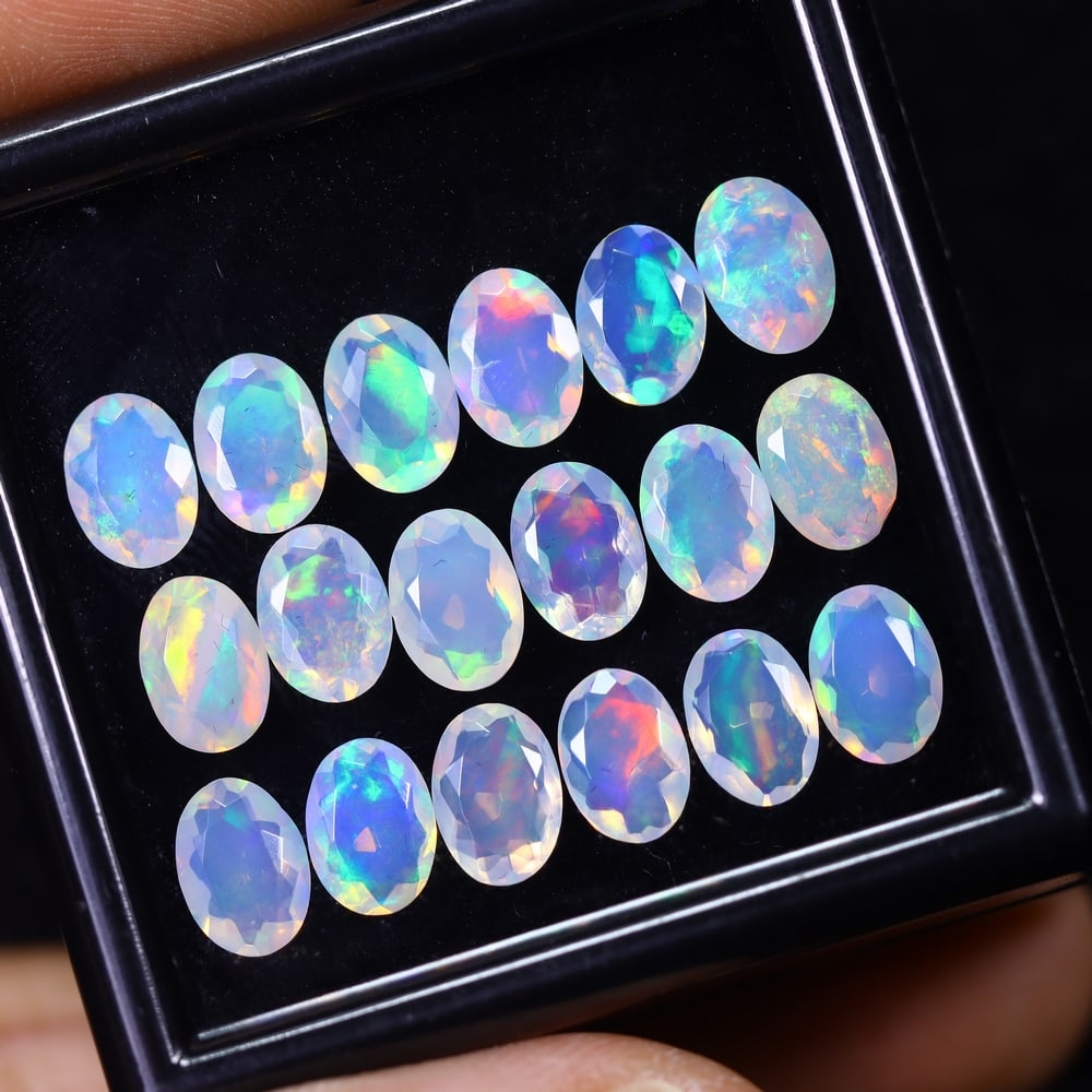 *8.70Ct 18pcs Calibrated 7x5mm Faceted Welo Opal Set - Ethiopian Opal: Ksmith Jewels Global Welcome to our auction house, today auction brought to you by Ksmith Jewels Global based in Penang, Malaysia specialize in all kinds of opal and color gemstone both in manufacturi