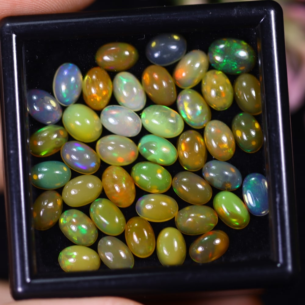 13.34Ct Welo Opal Lot - Ethiopian Opal: Ksmith Jewels Global Welcome to our auction house, today auction brought to you by Ksmith Jewels Global based in Penang, Malaysia specialize in all kinds of opal and color gemstone both in manufacturi