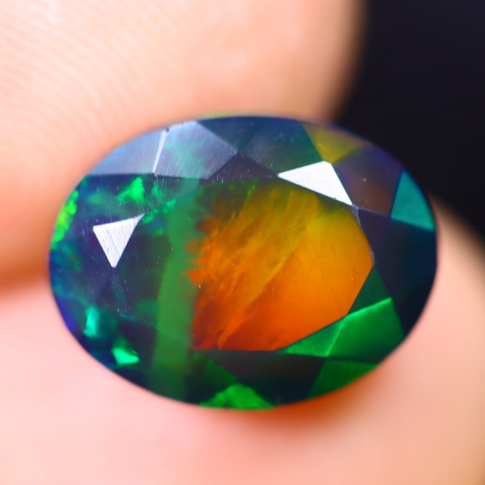 3.34Ct Welo Black Opal Polished - Ethiopian Opal - Oval Faceted: Ksmith Jewels Global Welcome to our auction house, today auction brought to you by Ksmith Jewels Global based in Penang, Malaysia specialize in all kinds of opal and color gemstone both in manufacturi