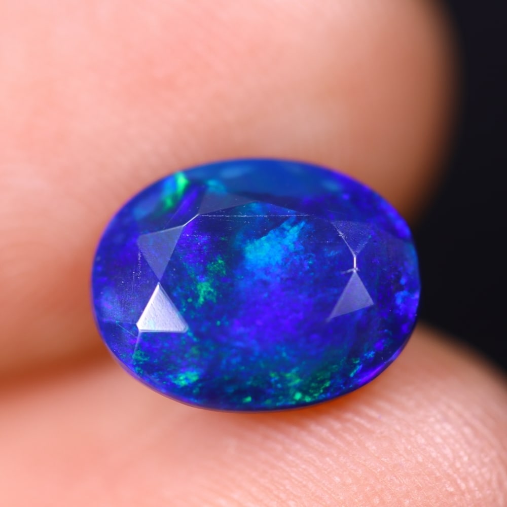 1.49Ct Welo Black Faceted Opal Polished - Ethiopian Opal (1 of 5)