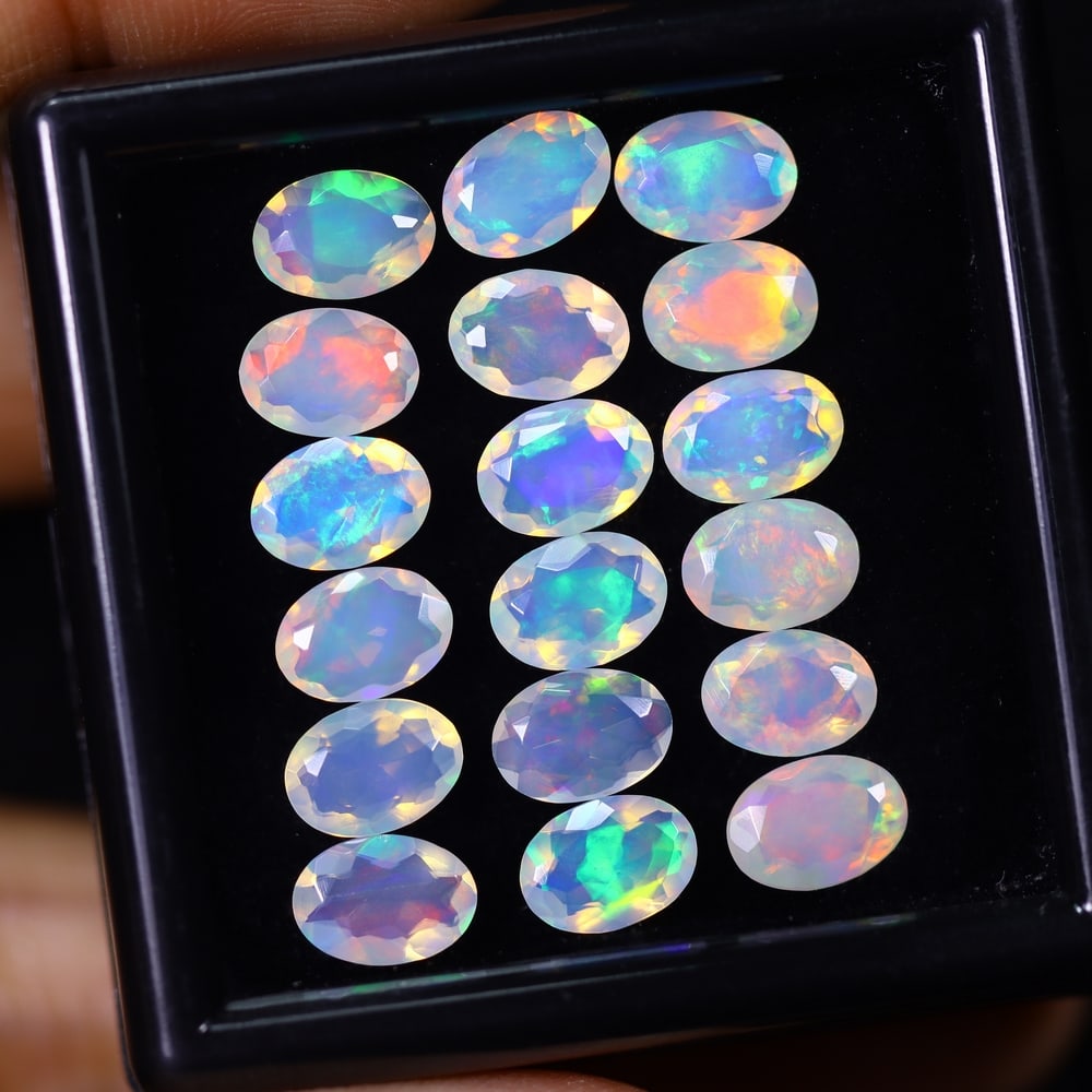 *8.76Ct 18pcs Calibrated 7x5mm Faceted Welo Opal Set - Ethiopian Opal: Ksmith Jewels Global Welcome to our auction house, today auction brought to you by Ksmith Jewels Global based in Penang, Malaysia specialize in all kinds of opal and color gemstone both in manufacturi