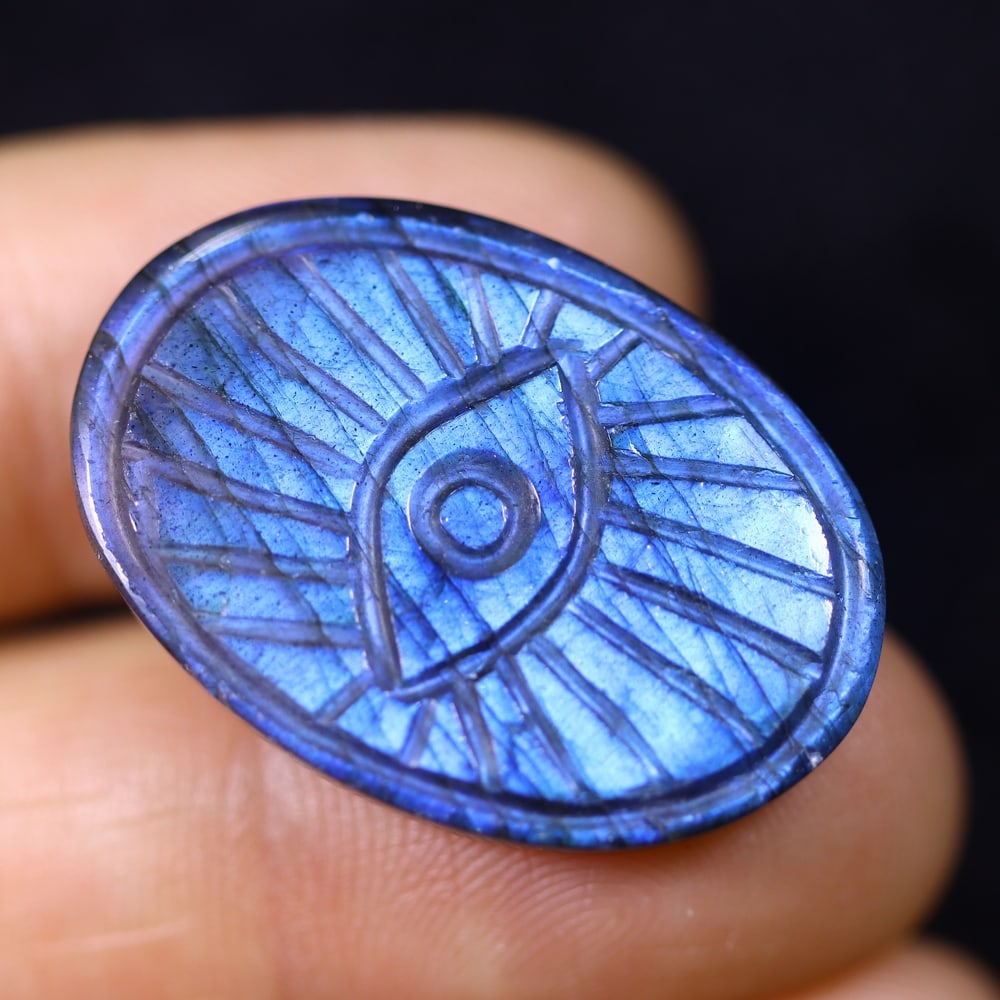 23.99cts Labradorite Evil Eye - Carving: Ksmith Jewels Global Welcome to our auction house, today auction brought to you by Ksmith Jewels Global based in Penang, Malaysia specialize in all kinds of opal and color gemstone both in manufacturi