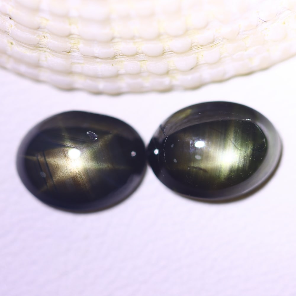 4.05cts 6 Rays Black Star Sapphire Pair, 268E: Ksmith Heritage Auctioneers Welcome to our auction house, today auction brought to you by Ksmith Heritage Auctioneers based in Penang, Malaysia specialize in all kinds of opal and color gemstone both