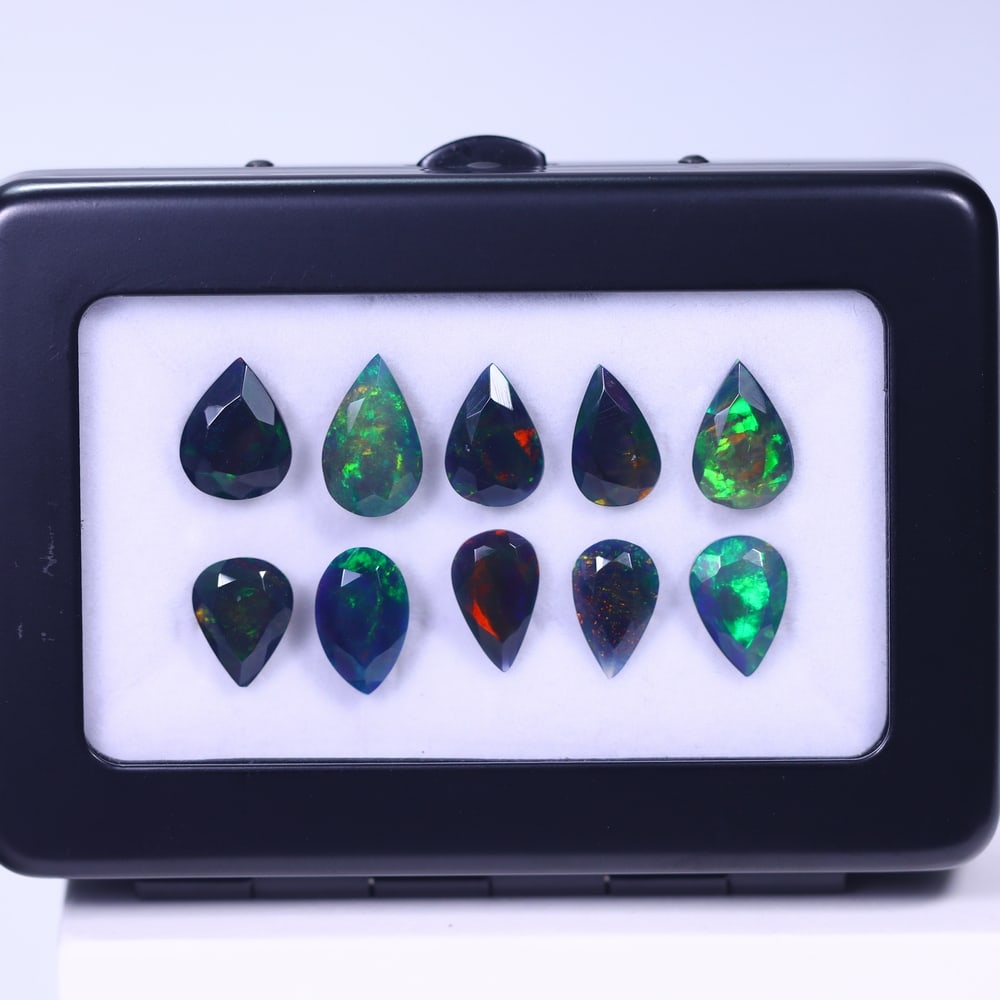 *14.93Ct 10pcs Faceted Smoked Welo Opal Set - Ethiopian Opal, 402E: Ksmith Heritage Auctioneers Welcome to our auction house, today auction brought to you by Ksmith Heritage Auctioneers based in Penang, Malaysia specialize in all kinds of opal and color gemstone both