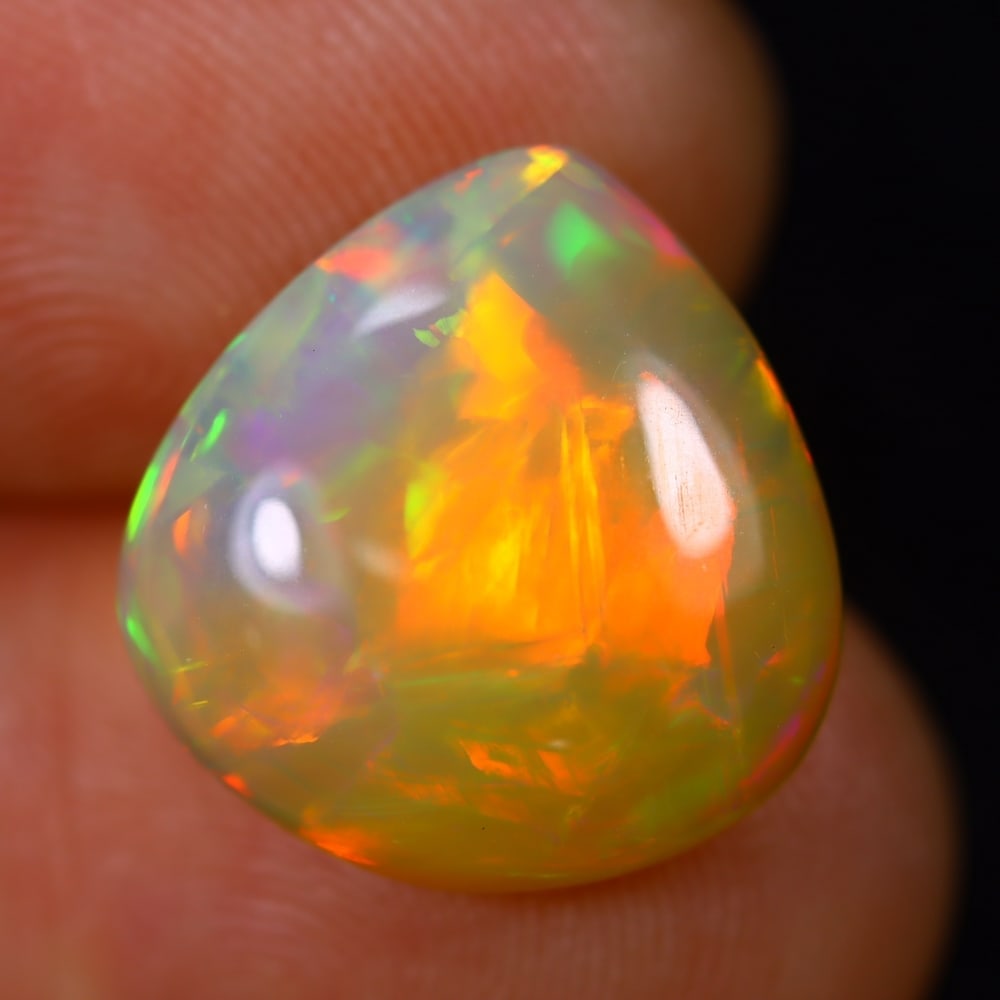 *4.77Ct Welo Opal Polished - Ethiopian Opal - Pear Cabochon, 929B: Ksmith Heritage Auctioneers Welcome to our auction house, today auction brought to you by Ksmith Heritage Auctioneers based in Penang, Malaysia specialize in all kinds of opal and color gemstone both